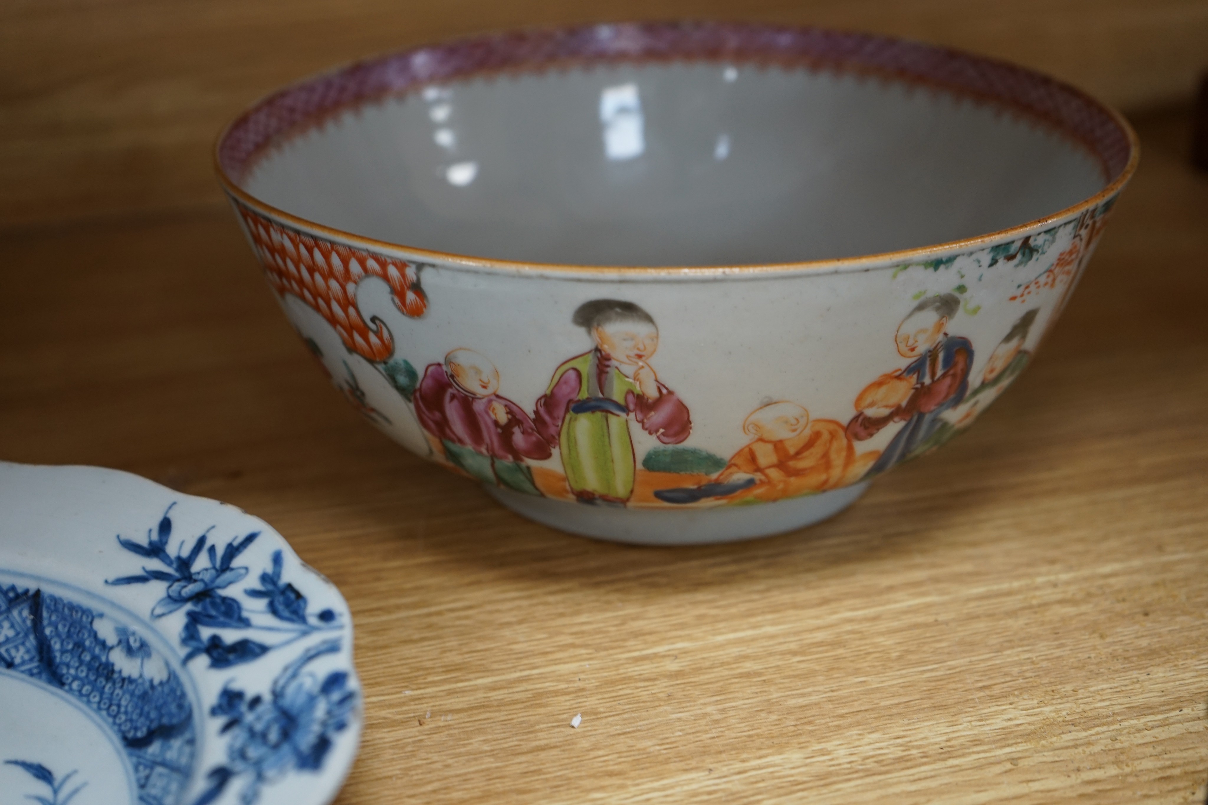 Three 18th century Chinese export porcelain bowls, largest 28 cm and two plates